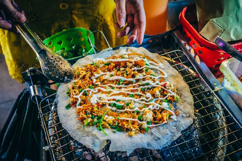 Known for its tasty street food, and a burning question: will I get food poisoning in Vietnam? 